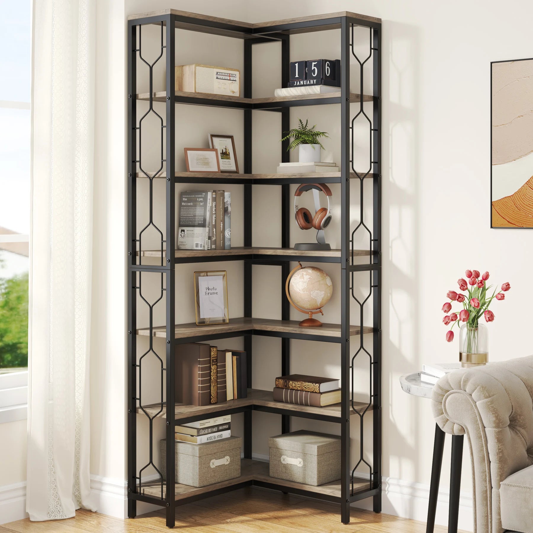 A sleek, space-efficient corner bookcase featuring a hexagonal frame, sturdy wood shelves, and metal railings for safety and modern appeal.